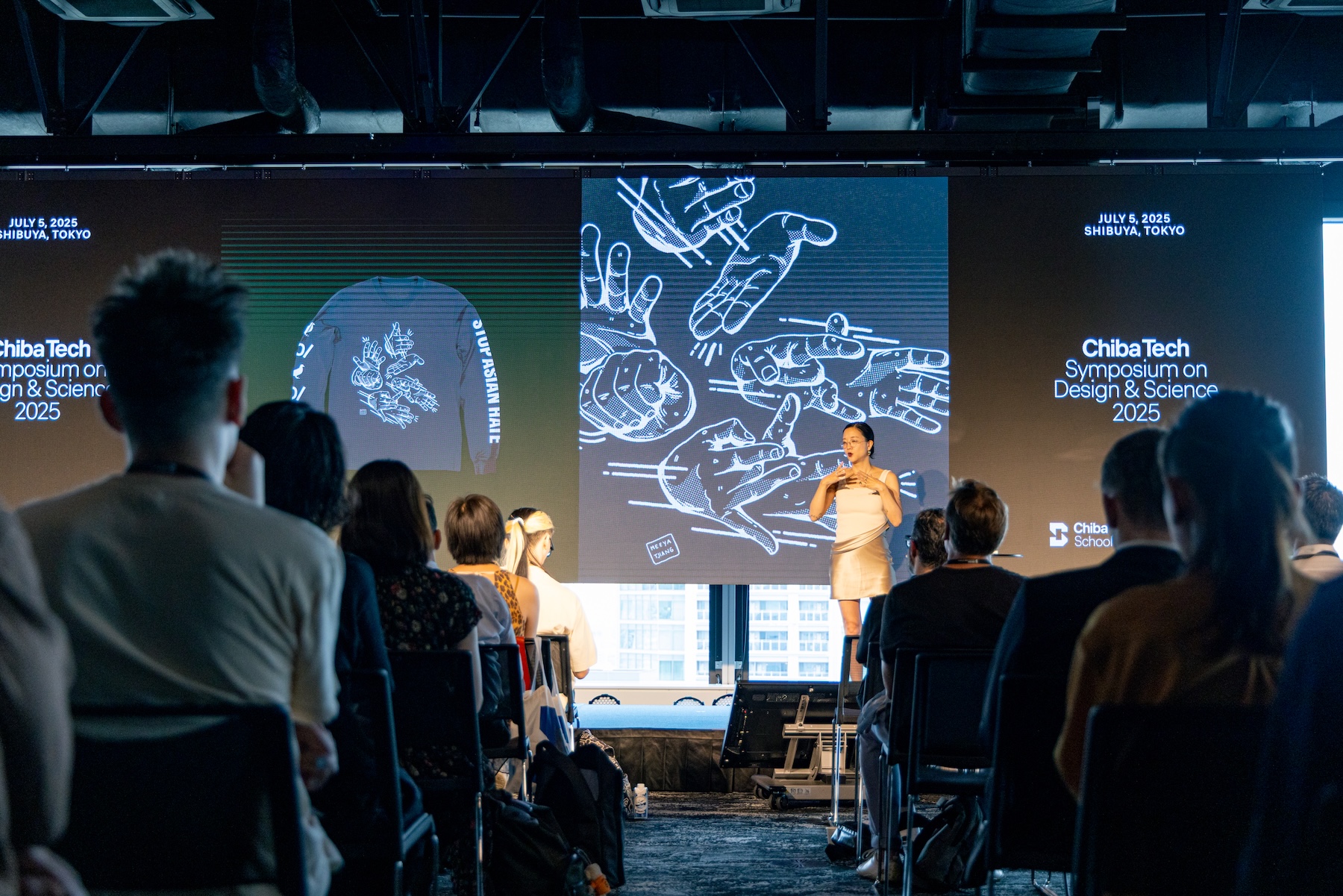 講演中のクリスティン・サン・キム氏